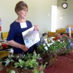 #Sylvia Tweten demonstrating hanging flower baskets 7-12-16 IMG_0144